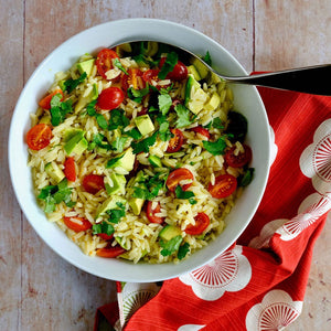 Spelt orzo salad with tomato, avocado and herbs